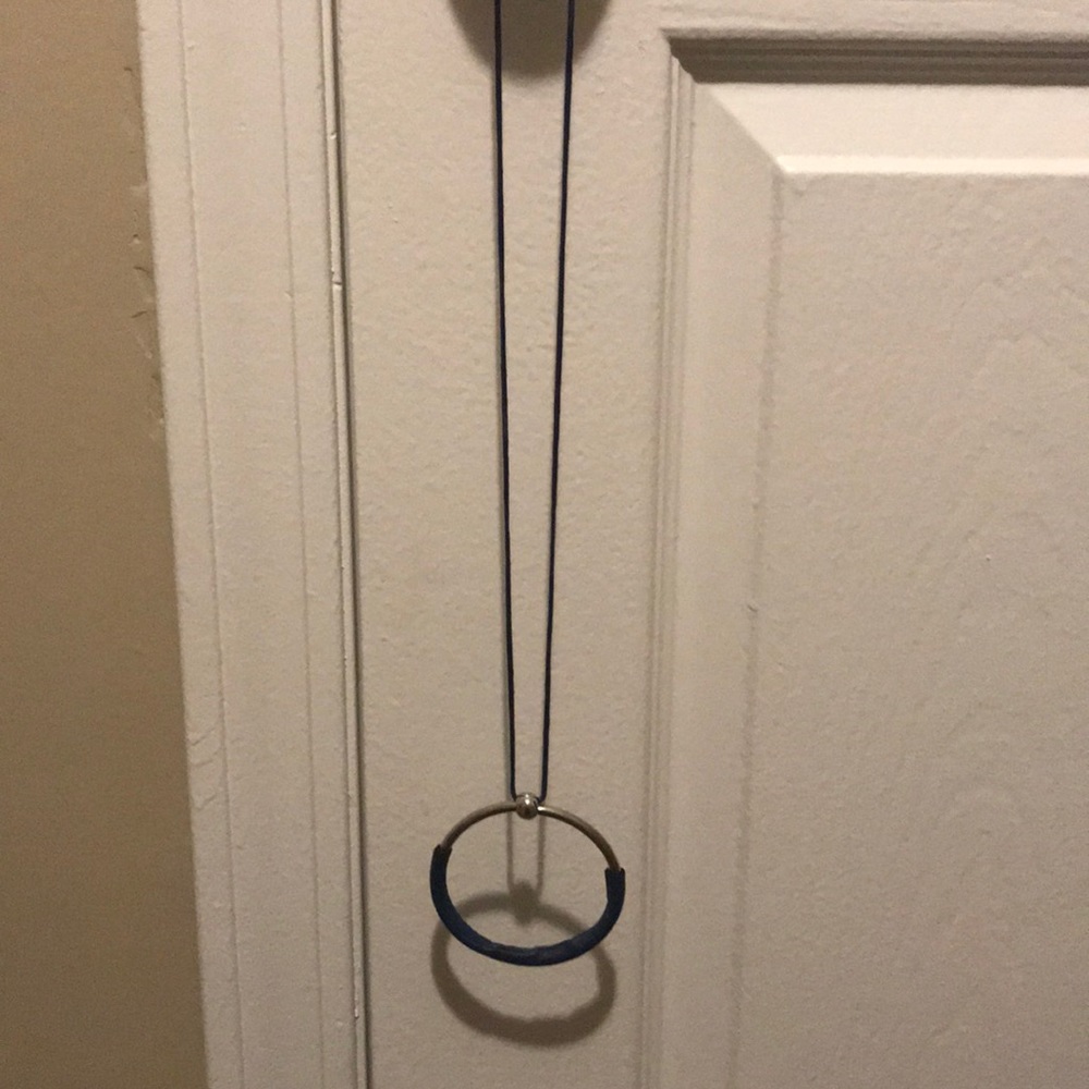 Long necklace with circle design